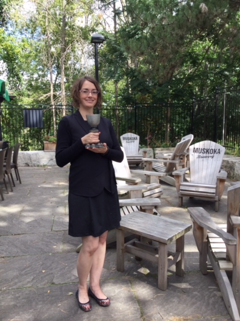 Crystal Beaudoin with the metal chalice on the day of her thesis defence